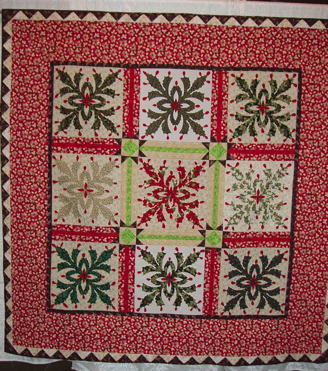    Ribbon Winner 16 E 04 Marjorie Hall - Christmas Cactus - 3rd Place Large Traditional Applique/Mixed Commercially Quilted